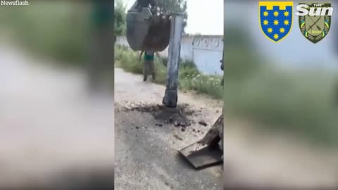 Ukrainian soldiers carefully detonate deadly Russian mines