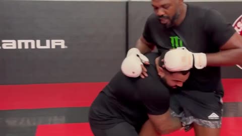 Jon Jones Almost KO's Gable Steveson With a Flying Knee in Training