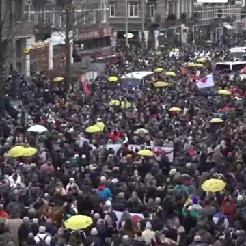 Scuffles break out in Amsterdam as thousands take