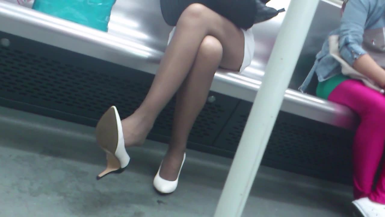 Chinese lady dangles her heels...