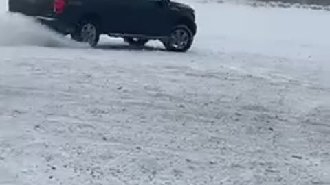 F150 fully loaded doing donuts in the snow