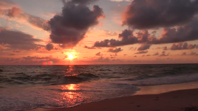 Beach Waves And Sunset