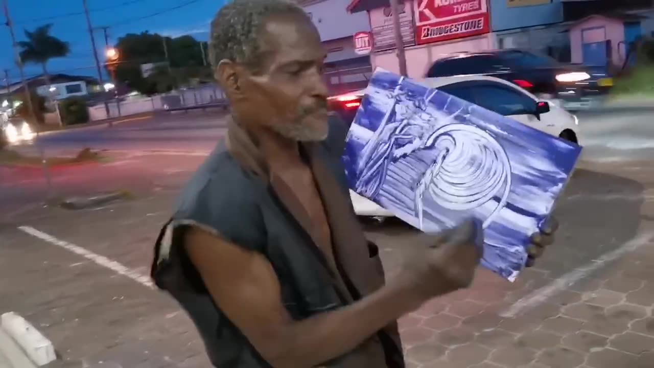 Amazing painting of this man in the street