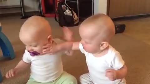 Twin baby fight