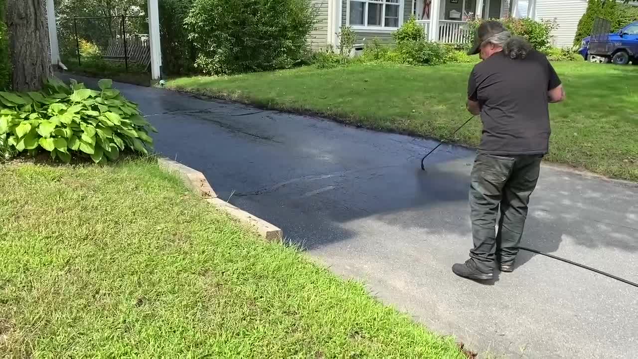 Professional Asphalt Spray Sealing: “The Grumpy One” Top Coats Pavement Maintenance