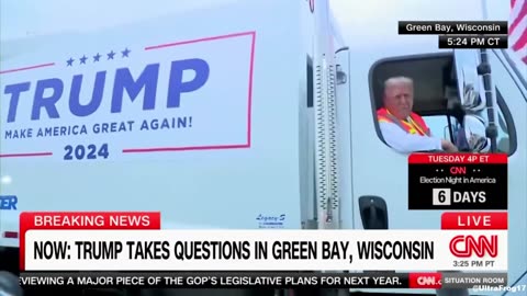 Trump in a garbage truck. It happened.