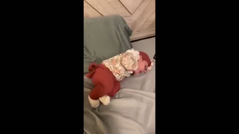 Baby sneezes so hard she accidentally punches herself in the face