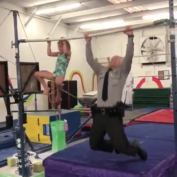7-year-old gymnast challenges state trooper to pull-up challenge