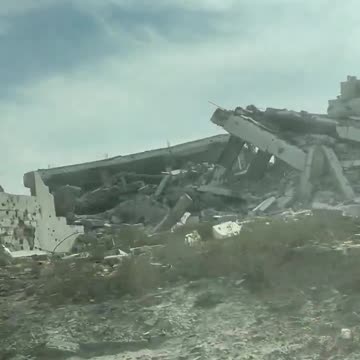 Today entering Gaza City. The ruins of life. A donkey laying dead ...