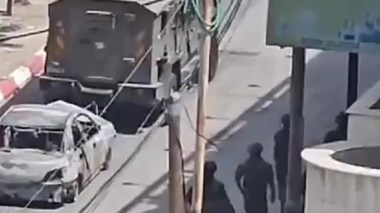 IDF forces are towing the car of the Israeli who was murdered this morning P2