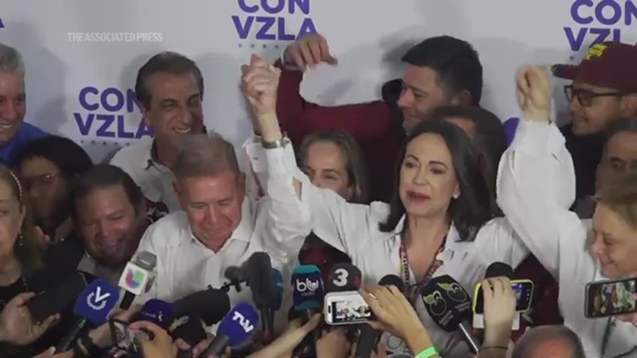 Supporters of Maduro and opposition shout at each other on Venezuela's election day