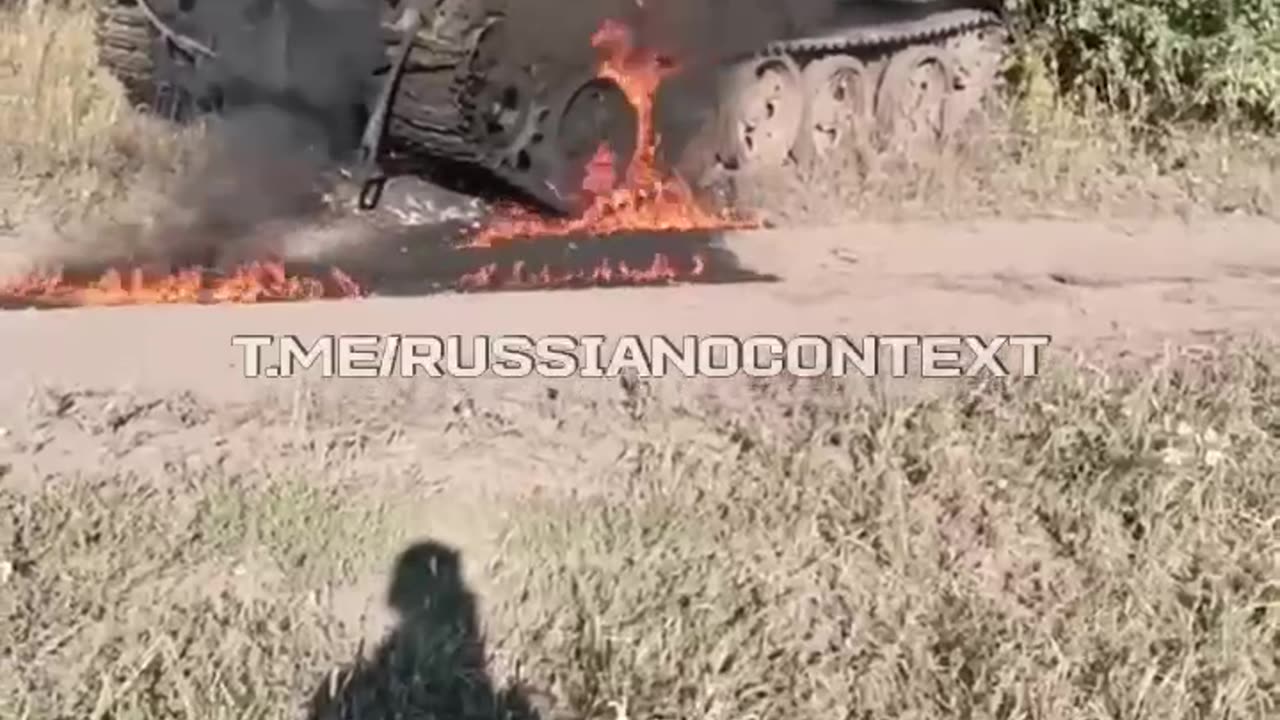 Russian Soldier Says Goodbye to Burning Tank