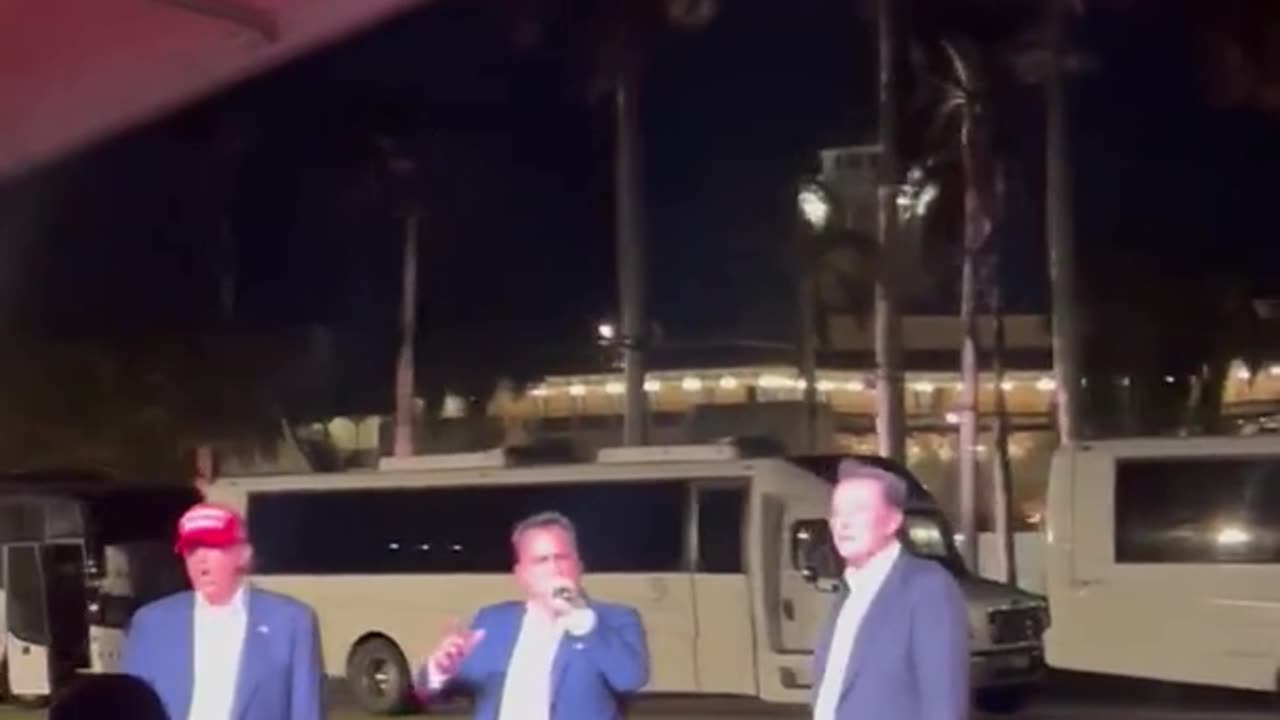 President Trump, Elon Musk, and Chris Macchio sing God Bless America at the Mar a Lago