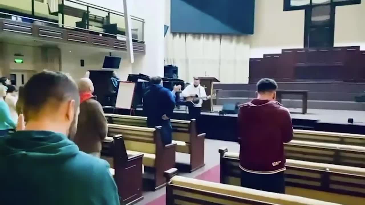 Worshiping while bombs are falling.