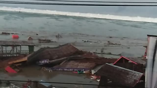 Tsunami Crashes into Indonesian City