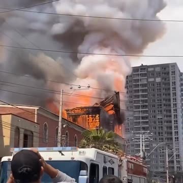 TOWER OF HISTORIC CHILEAN CHURCH TUMBLES INTO FLAMES