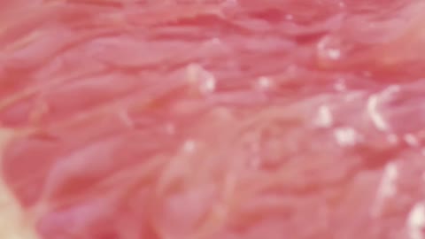 Texture of fresh grapefruit slices