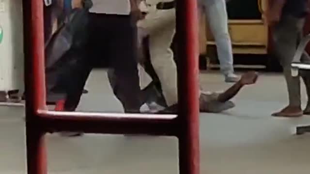 Policeman brutally beating up an old man in MP, India