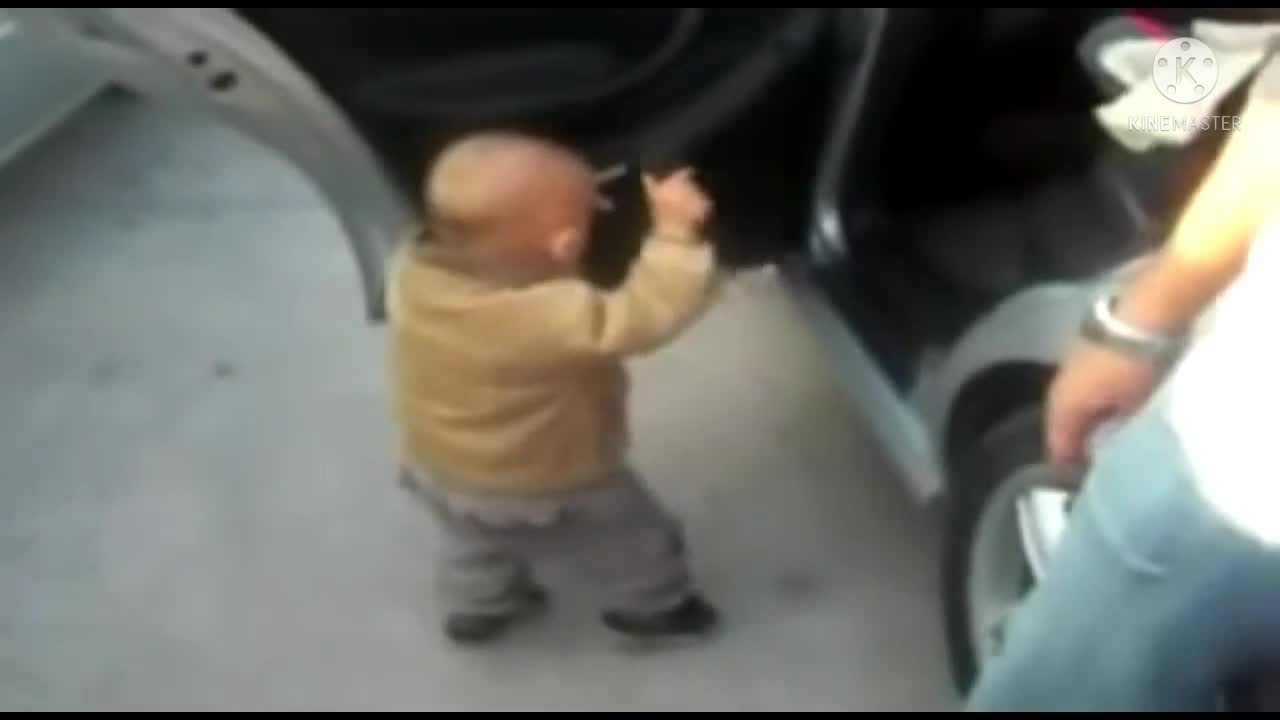 Baby dancing on street