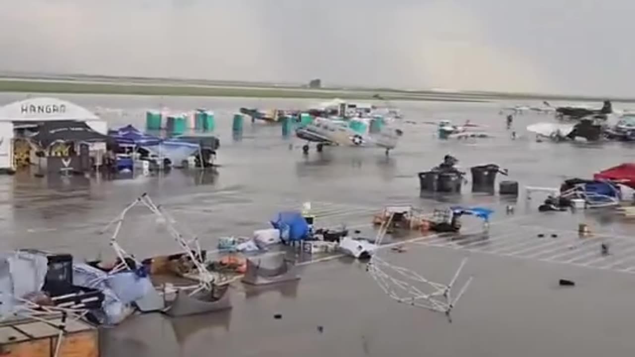 CRAZY footage from the McConnell AFB Airshow today. A microburst did some damage.