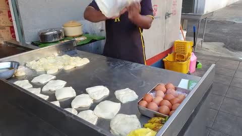 Roti Canai preparation in the early morning at ravi solaris Kuala Lumpur