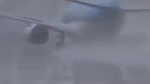 Plane taking off during a storm