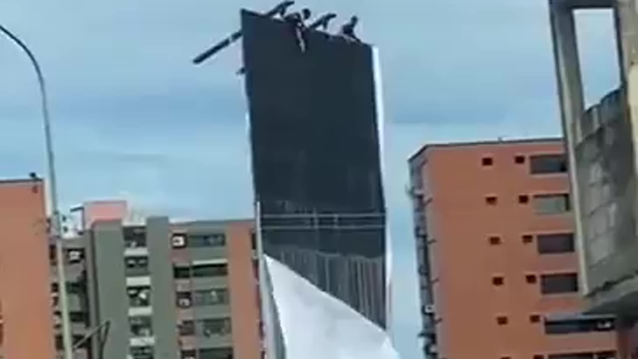 " Maduro's Posters Being Torn Down in Venezuela – A Sign of Defiance"