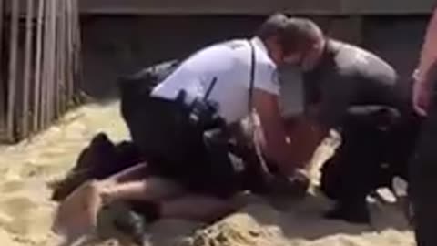 New Jersey, US Surfer is put in choke hold by system pigs for not displaying his ‘surf badge’