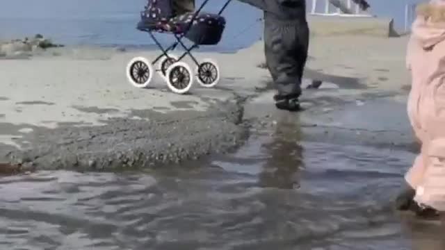 Toddler Takes A Tumble Into Puddle