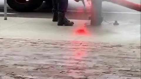 Girl accept the challenge of opening beer bottle with heels .