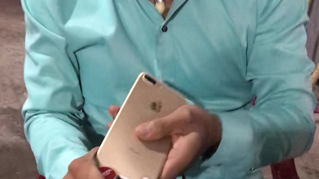 Guy Attempts To Open Bottle With IPhone