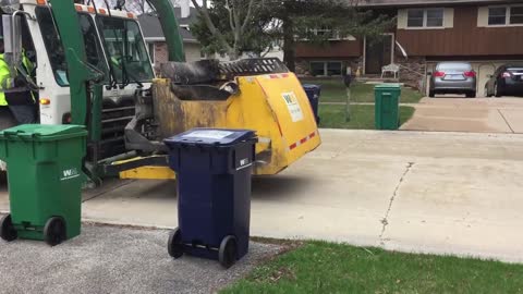 Garbage Truck Bursts Into Flames