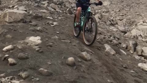 Mountain Biker Falls Down Rocky Slope