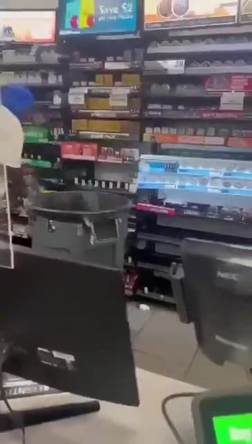 Thief just helping himself to cigarettes but the store owners give him a damn good beating!