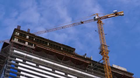 Zooming out of a construction site with a crane