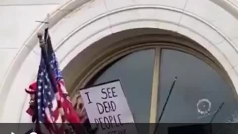 Patriots try to stop the windows to the capital building being smashed