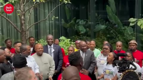 President Ramaphosa and Minister Lamola sing and dance with the Clermont Mass Choir in New York