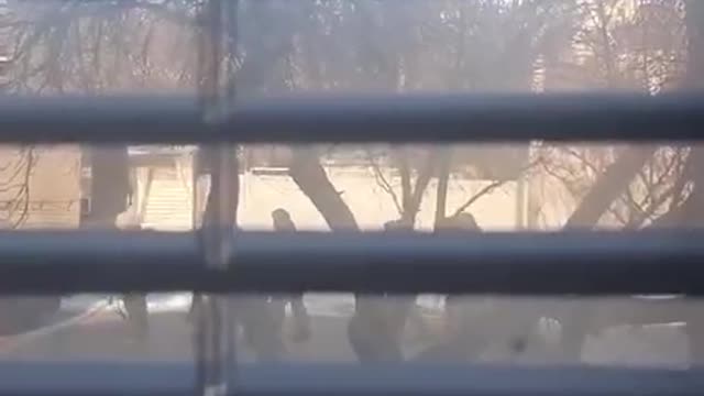 Russian infantry walking behind Tigr in Kharkiv