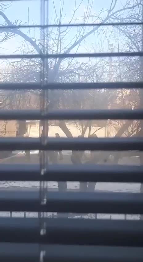 Russian infantry walking behind Tigr in Kharkiv