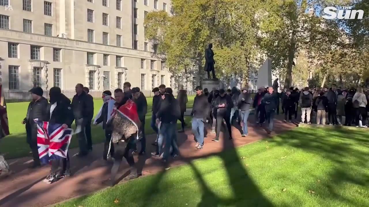 Protesters shouting 'England till I die' clash with cops near Cenotaph in London