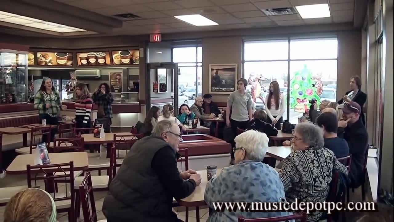 Talented Young Musicians Pull Off Christmas Flash Mob At Coffee Shop