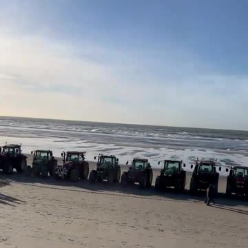 French farmers line the beach at Le Touquet in the Pas-de-Calais region,