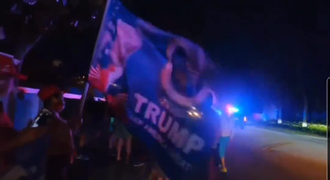 Trump supporters arrive outside Mar-A-Largo in Florida.