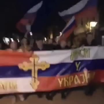 "Serbs in Montenegro - Russians in Ukraine" and chant Fuck NATO!