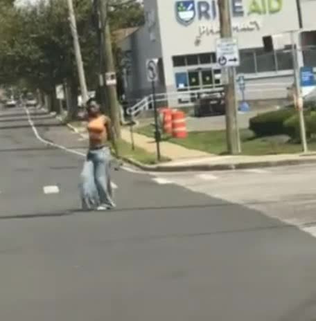 Crazy lady in Long Iland pointing gun at everyone.