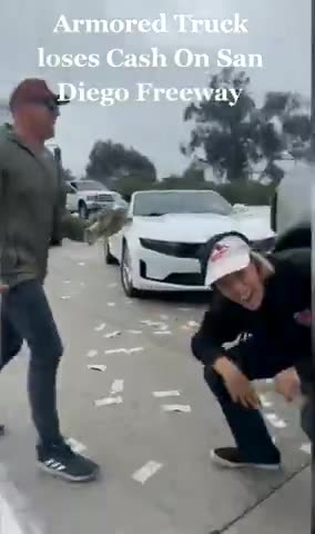 Armored Truck loses Cash on San Diego Highway