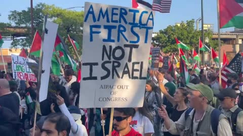 "AMERICA FIRST, NOT ISREAL" written on sign