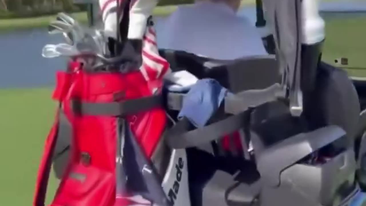 Donald Trump playing "It's a Man's, Man's, Man's World" in his golf cart