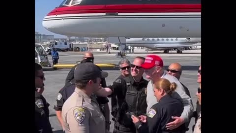 👀 What Did That Officer Hand Trump? 🤔