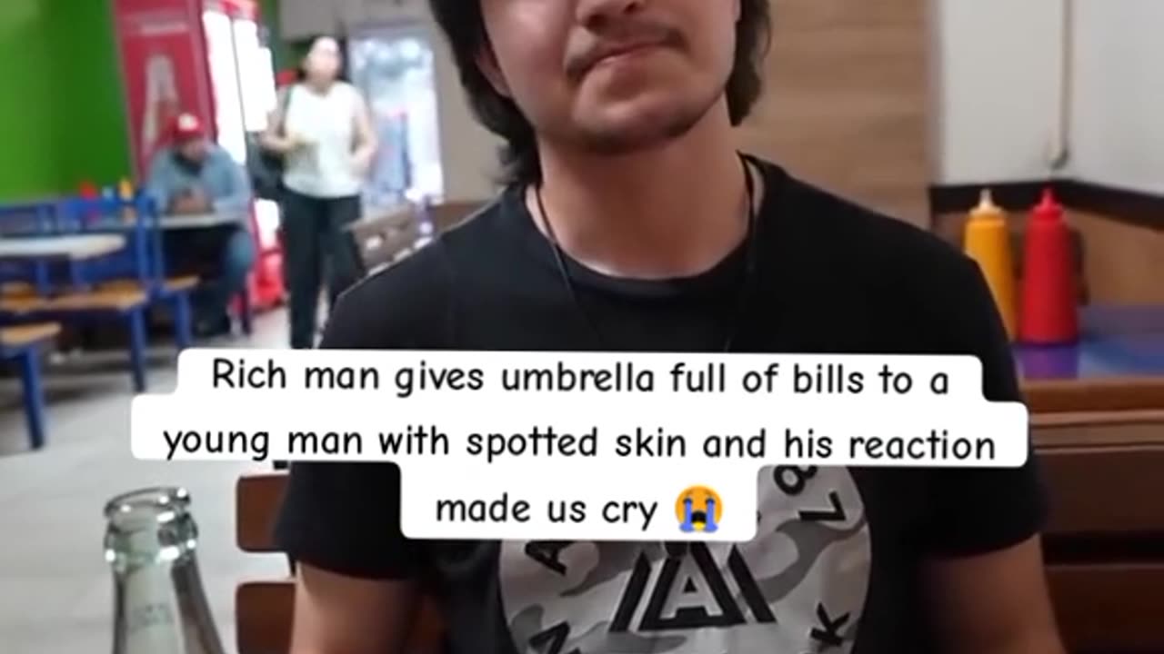 Rich man gives umbrella full of bills to a young man with spotted skin